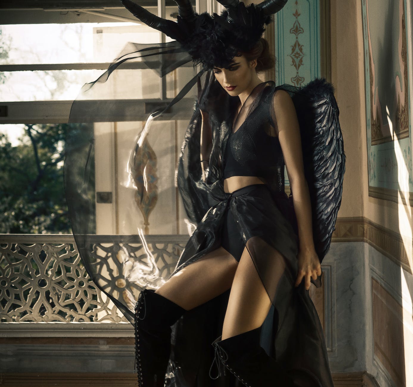 woman in black angel costume