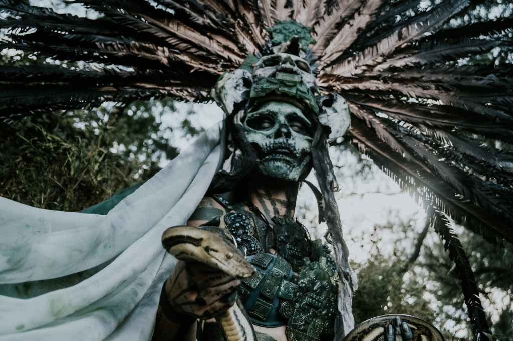 low angle view on person wearing costume of ancient god
