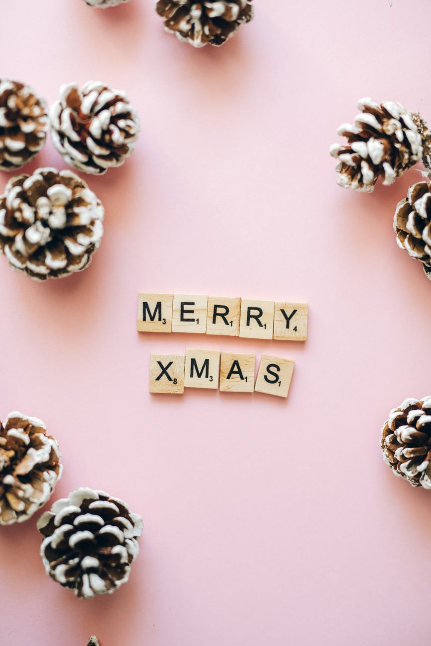 merry xmas text on wooden scrabble tiles Want to try 5 Christmas Project Ideas by Liberty? Get them Here!