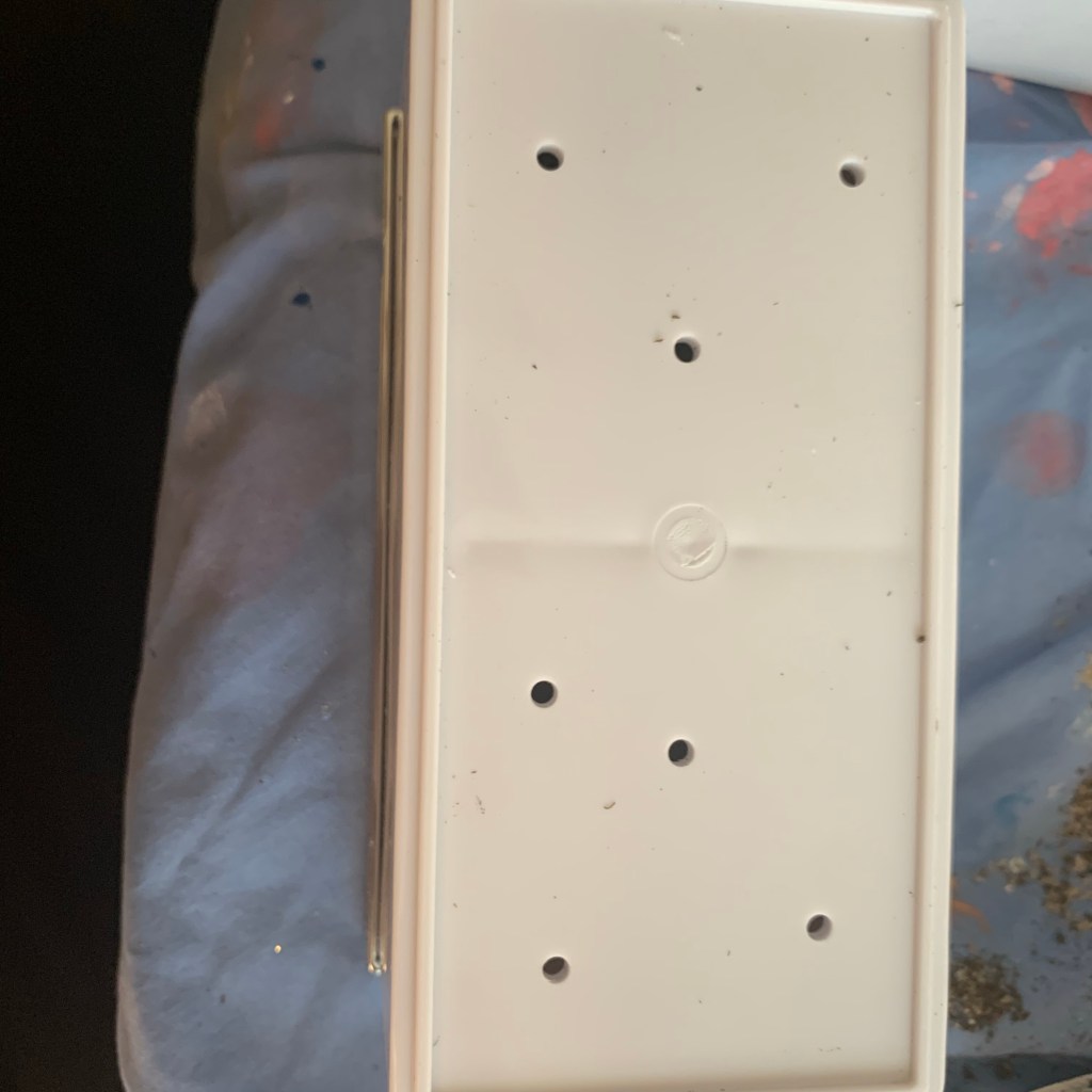 pot with drilled holes