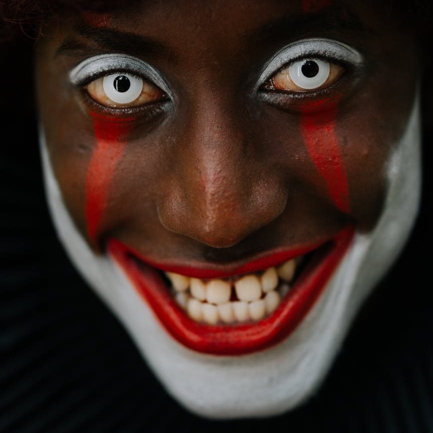 person in creepy clown makeup
