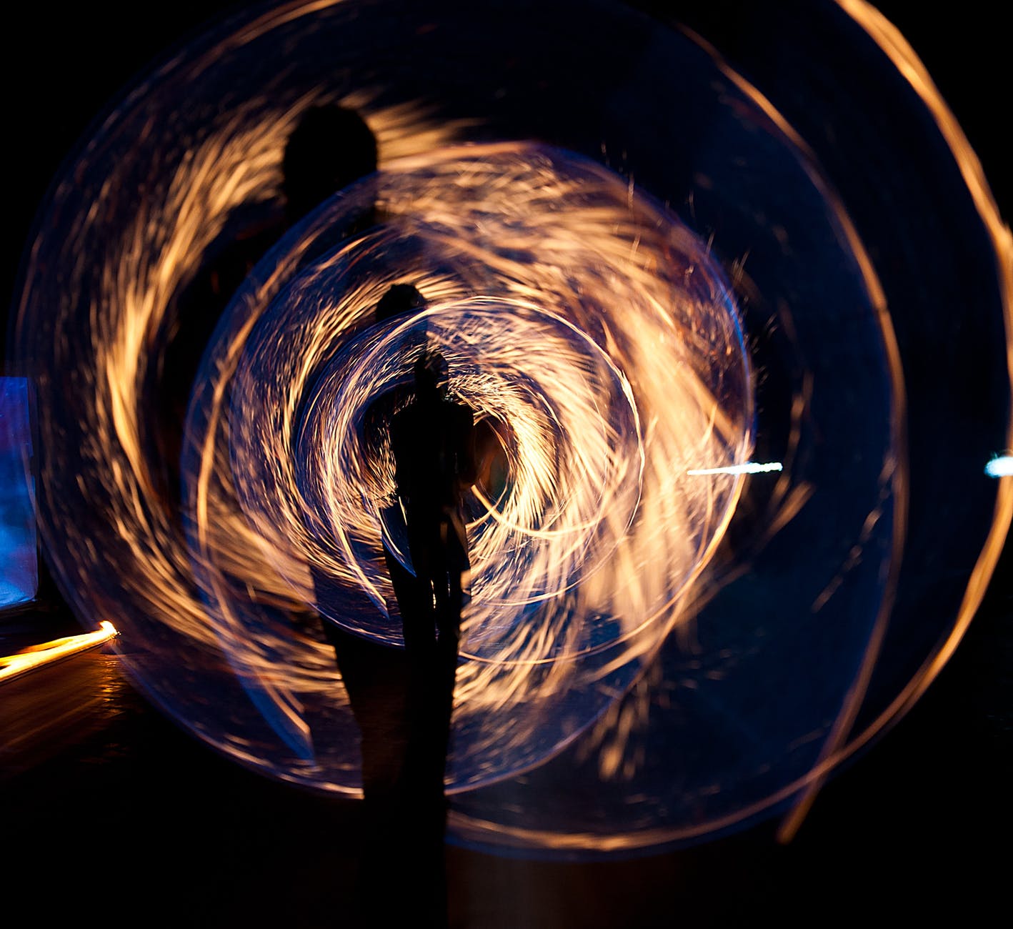 silhouette of person holding sparkler digital wallpaepr; urban fantasy