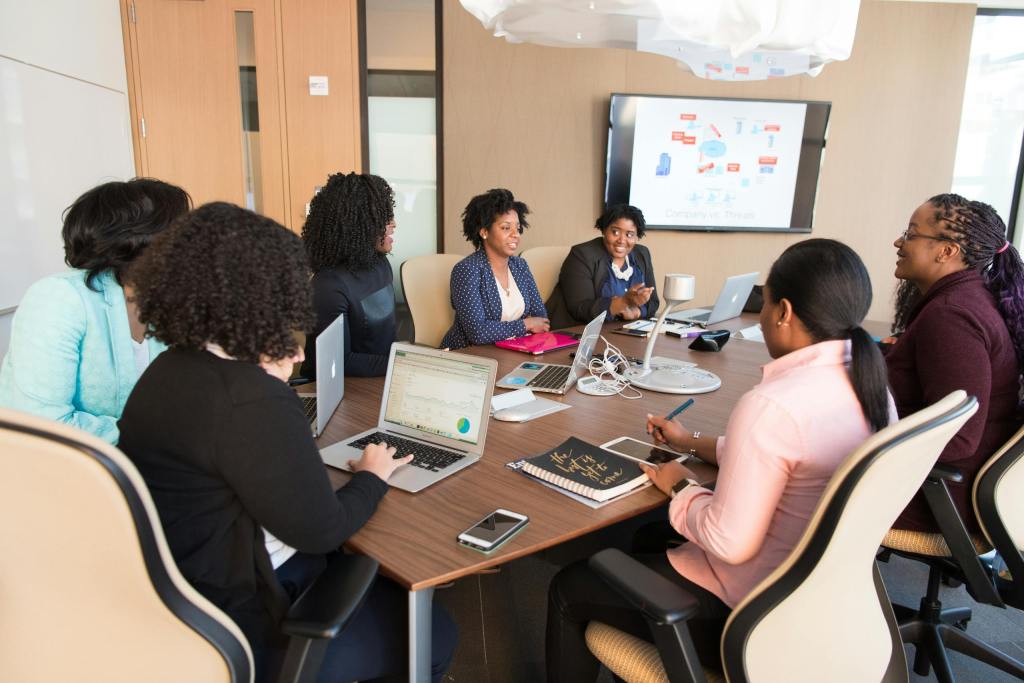 Photo by Christina Morillo black women brainstorming