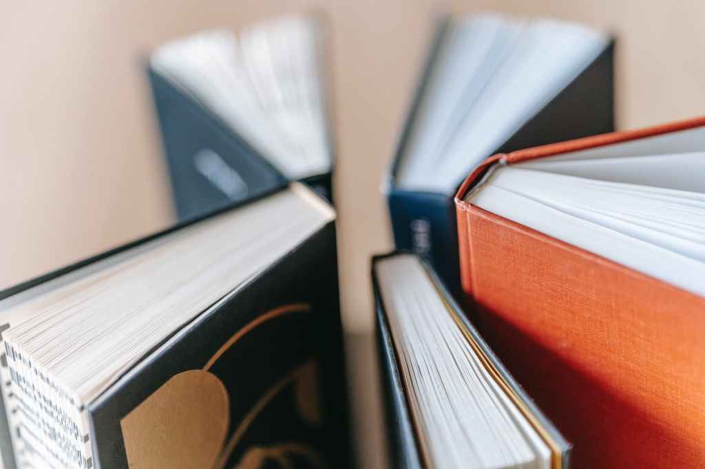 set of various books arranged on table: Photo by George Milton on Pexels.com