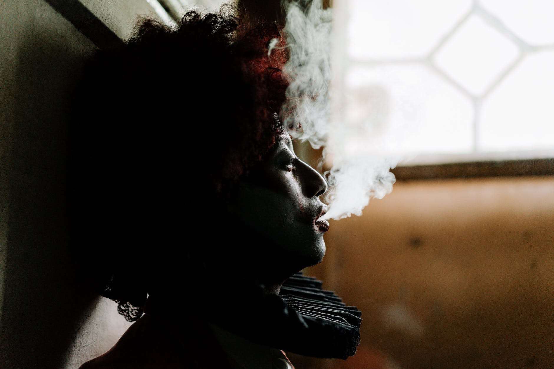 scary clown smoking